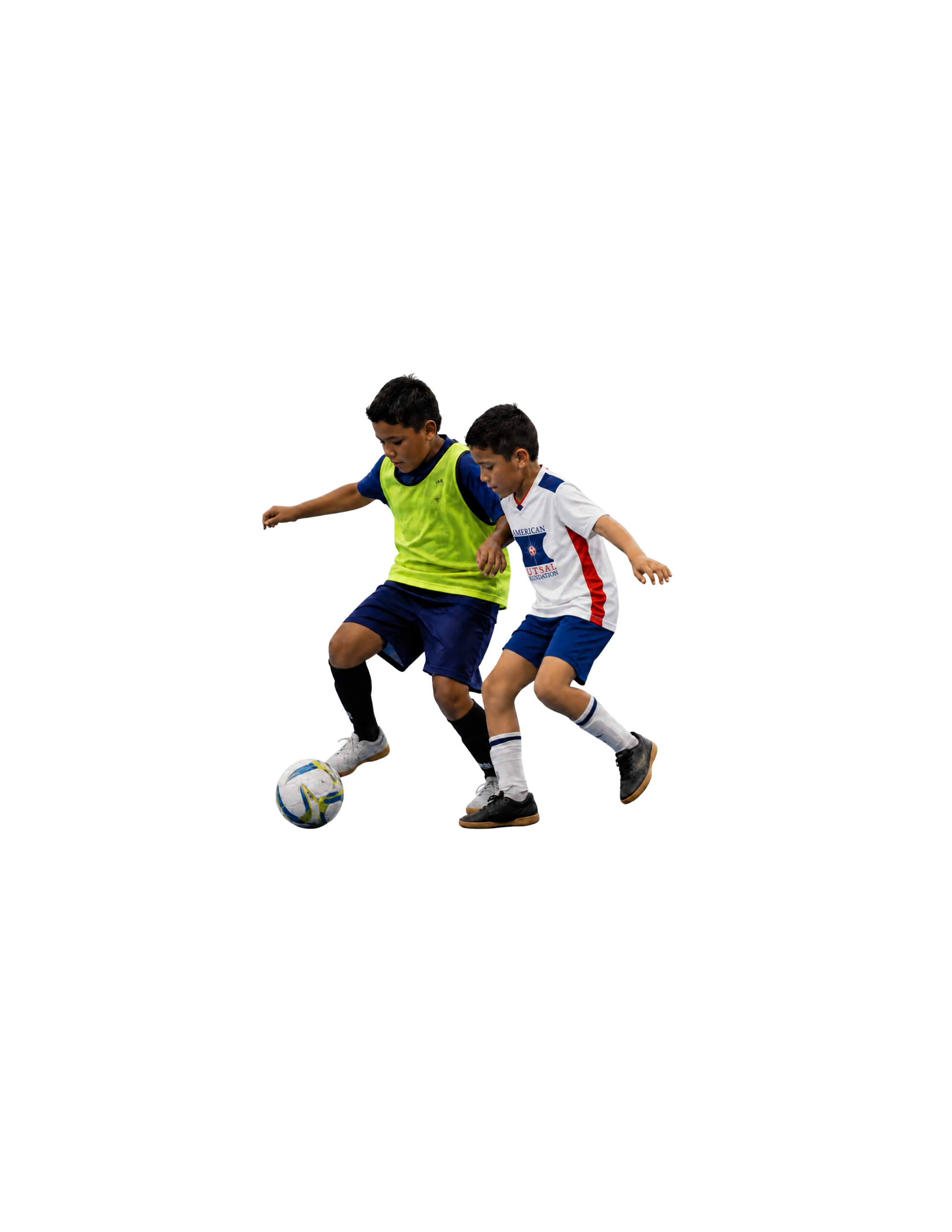 Youth futsal players challenging for the ball